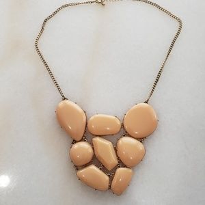 Beige embellished necklace